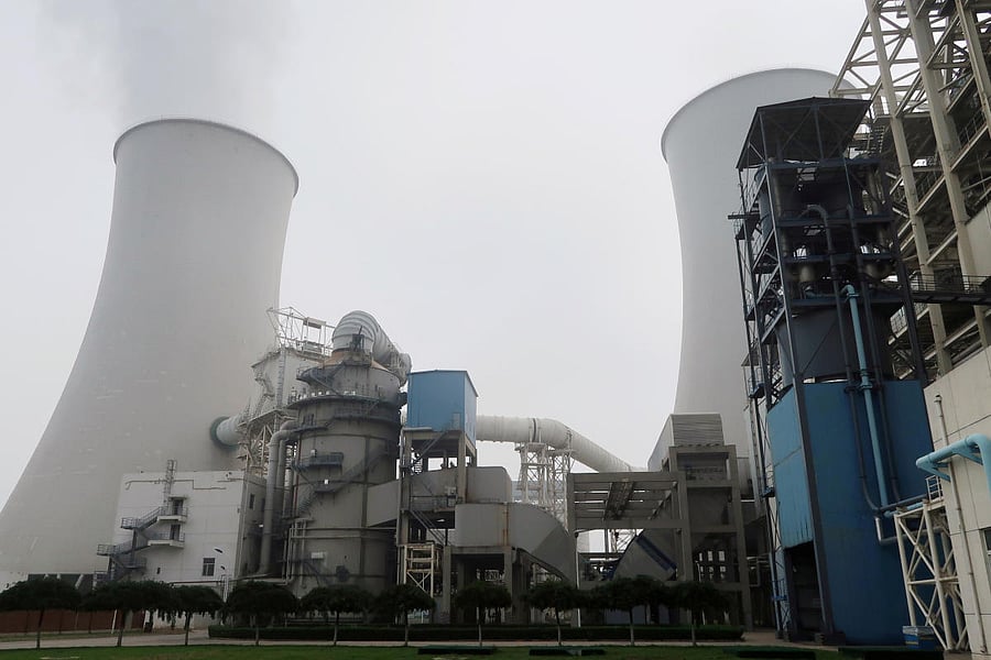 Smoke is seen from a cooling tower of a China Energy ultra-low emission coal-fired power plant in Sanhe, China. (Reuters Photo)