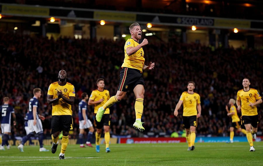 Belgium's Toby Alderweireld celebrates scoring their third goal with Romelu Lukaku. Reuters Photo