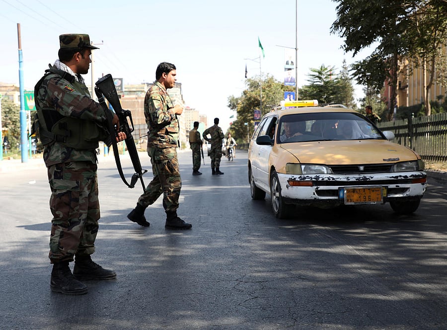 Afghan National Army (ANA) soldiers stand guard at a check point in Kabul, Afghanistan September 10, 2019. (Reuters)