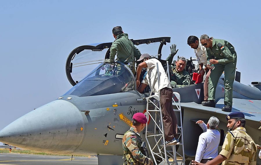  Chief of Army Staff Gen Bipin Rawat waves from the cockpit of the Light Combat Aircraft 'Tejas' before a sortie on the 2nd day of the 12th edition of Aero India 2019 air show at Yelahanka air base in Bengaluru, Thursday, Feb 21, 2019. DH Photo