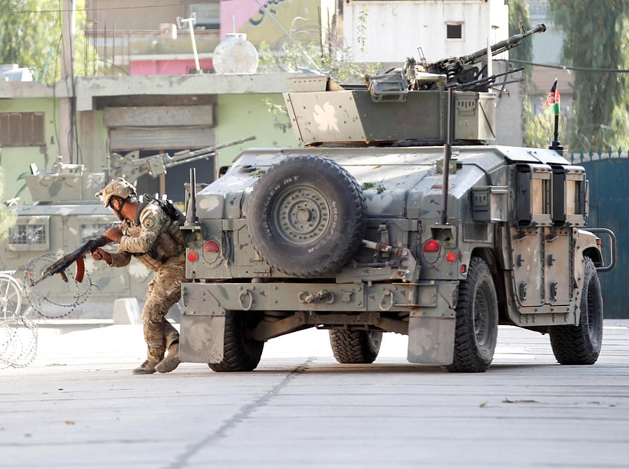 Afghan security forces (Photo by Reuters)