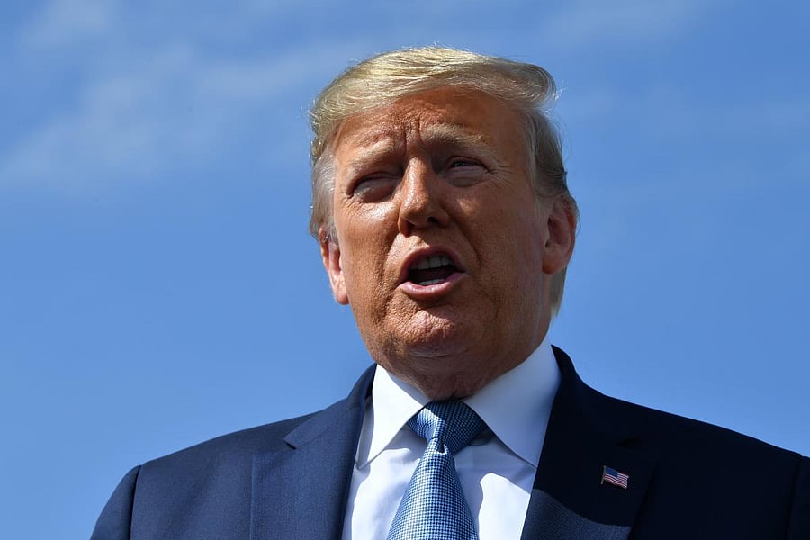 US President Donald Trump speaks on September 18, 2019 at Los Angeles International Airport in Los Angeles, California. (Photo by Nicholas Kamm / AFP)