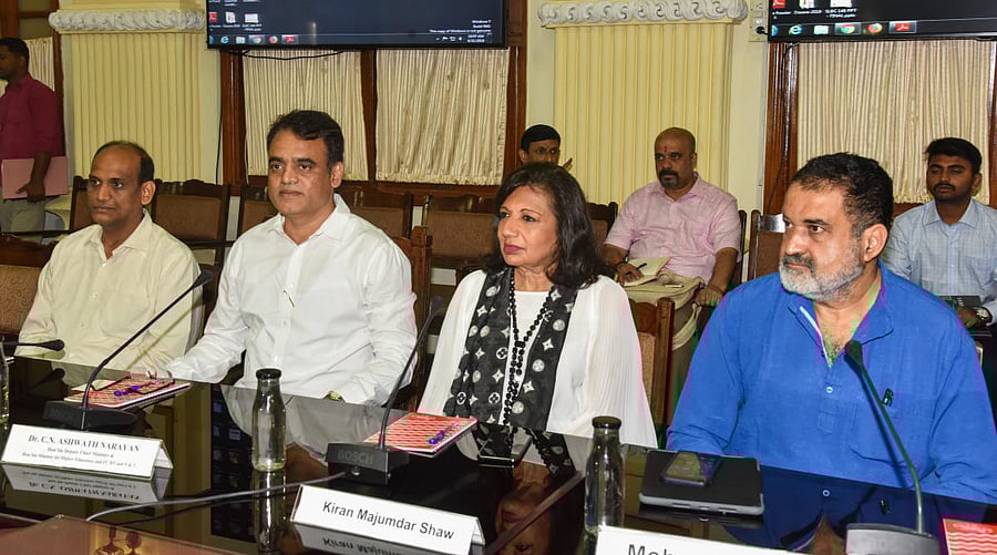 Principal secretary IT-BT Ramana Reddy, Deputy Chief Minister C N Ashwath Narayan, Biocon chief Kiran Mazumdar-Shaw, Manipal Global Education chairman T V Mohandas Pai at a meeting on Bengaluru development in Bengaluru on Saturday. DH PHOTO