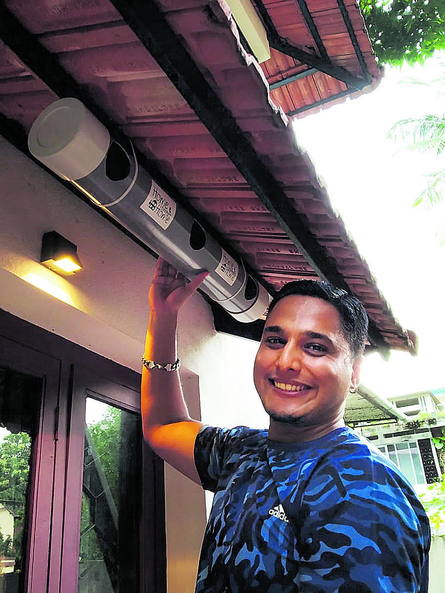 Muhammed Tauseef, with the bird nest designed by him.