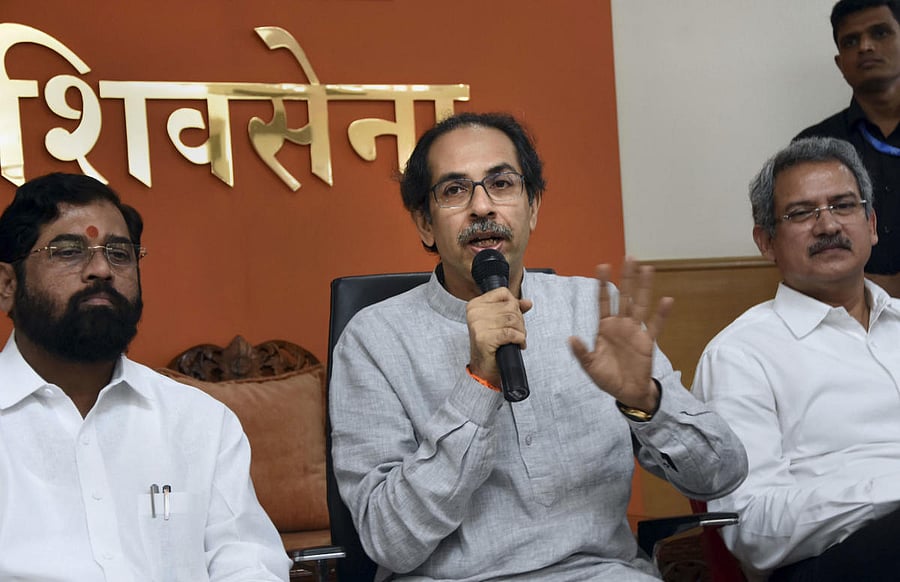 Mumbai: Shiv Sena chief Uddhav Thackeray during addresses a press conference at Shiv Sena Bhavan. Maharashtra Public Works Department Minister Eknath Shinde and Shiv Sena Leader Anil Desai are also seen. (PTI Photo)