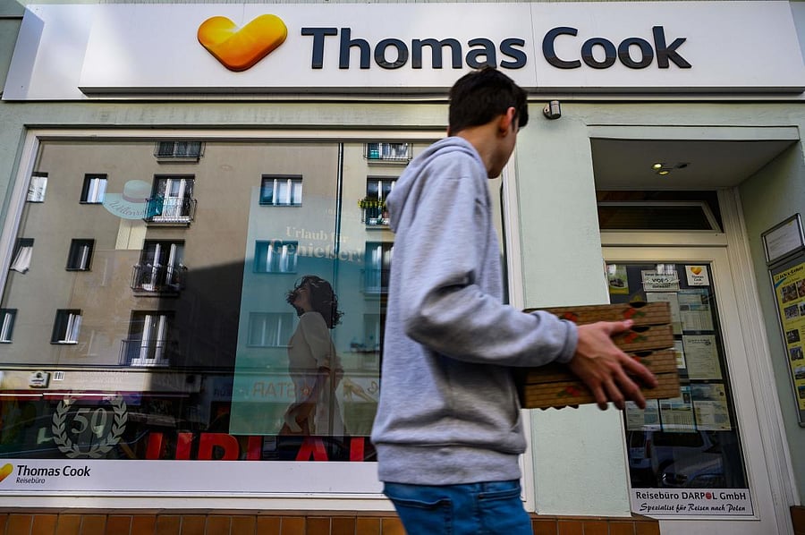 As British tour operator Thomas Cook declared bankruptcy, some 600,000 tourists from around Europe had their holidays disrupted. (Photo by John MACDOUGALL / AFP)