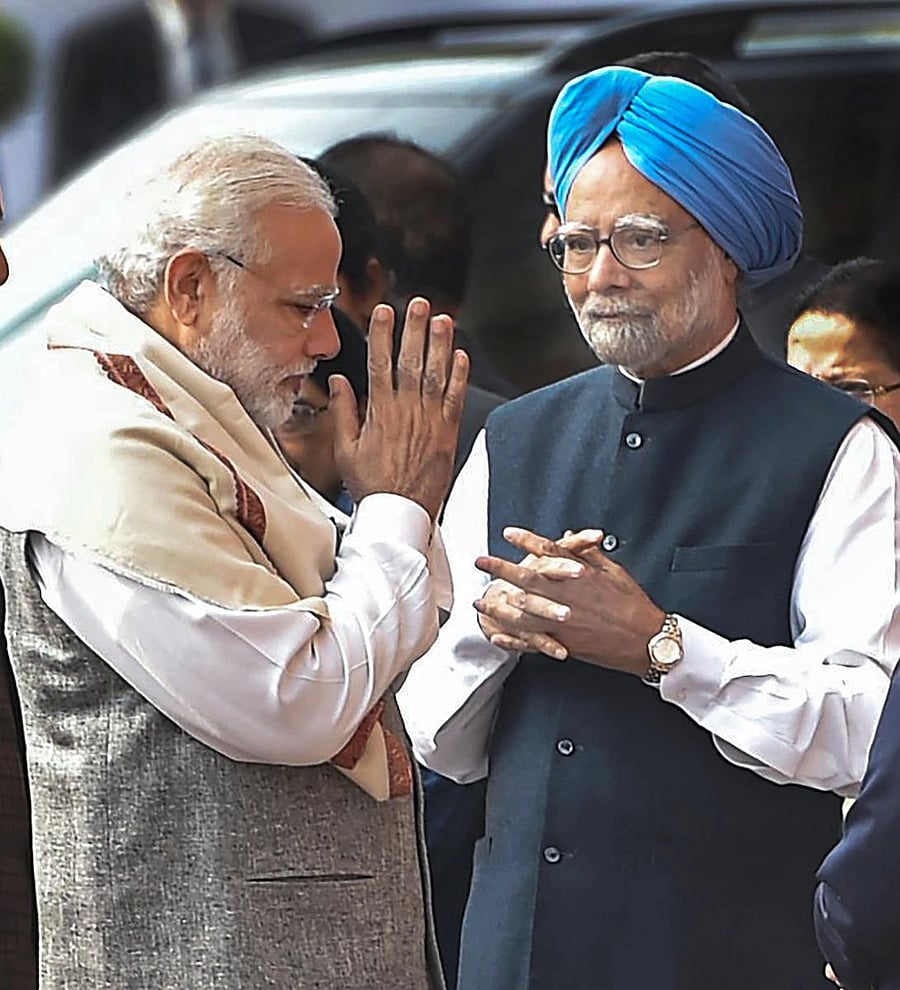 Prime Minister Narendra Modi and former prime minister Manmohan Singh. (PTI Photo)