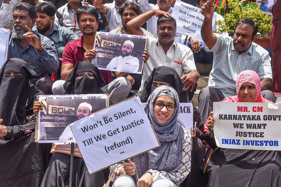 IMA investors protest to get their money back. DH FILE PHOTO