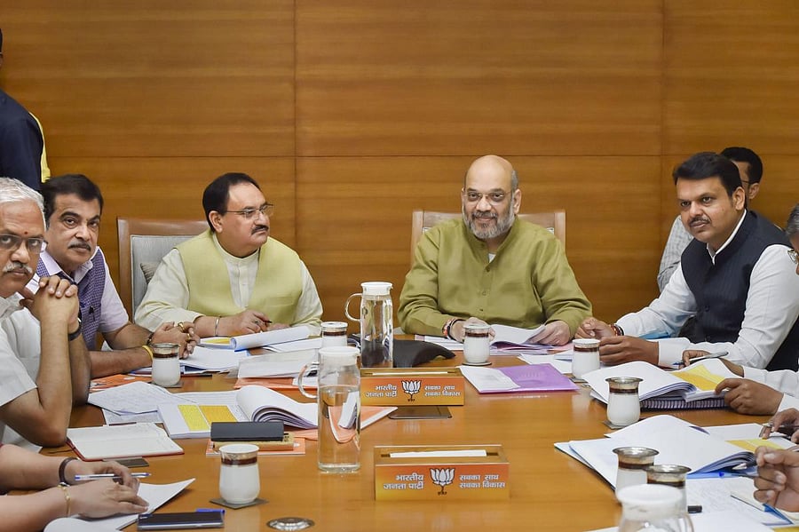 Home Minister Amit Shah, BJP Working President JP Nadda, Maharashtra Chief Minister Devendra Fadnavis and Union Minister for Micro Small and Medium Enterprises (MSME) Nitin Gadkari during a meeting at BJP HQ, in New Delhi, Thursday, Sept. 26, 2019. (PTI Photo/Ravi Choudhary)