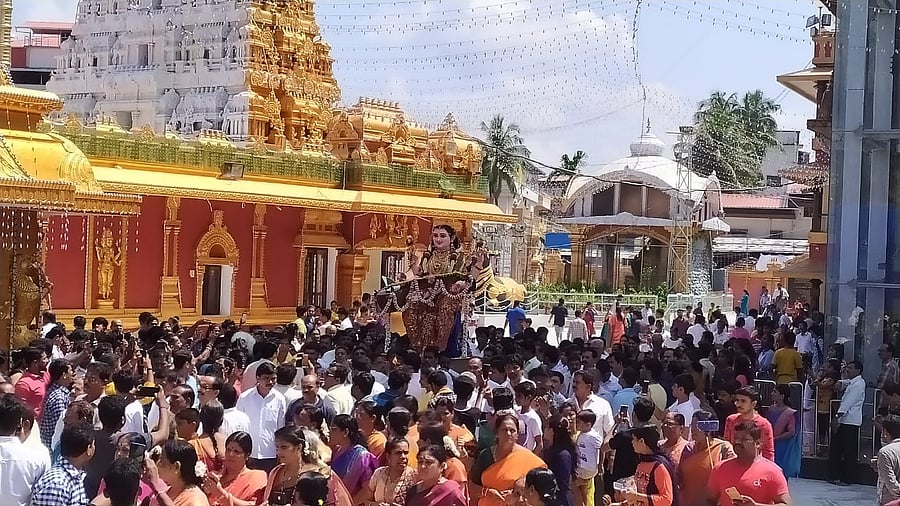 The bejewelled idol of Sharada donning a saree and playing the veena was the cynosure of all the eyes.  DH Photo/Govindraj Javali