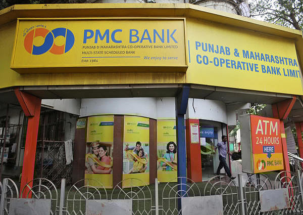 A man walks out from a Punjab and Maharashtra Co-operative Bank branch in Mumbai. (Photo/Reuters)