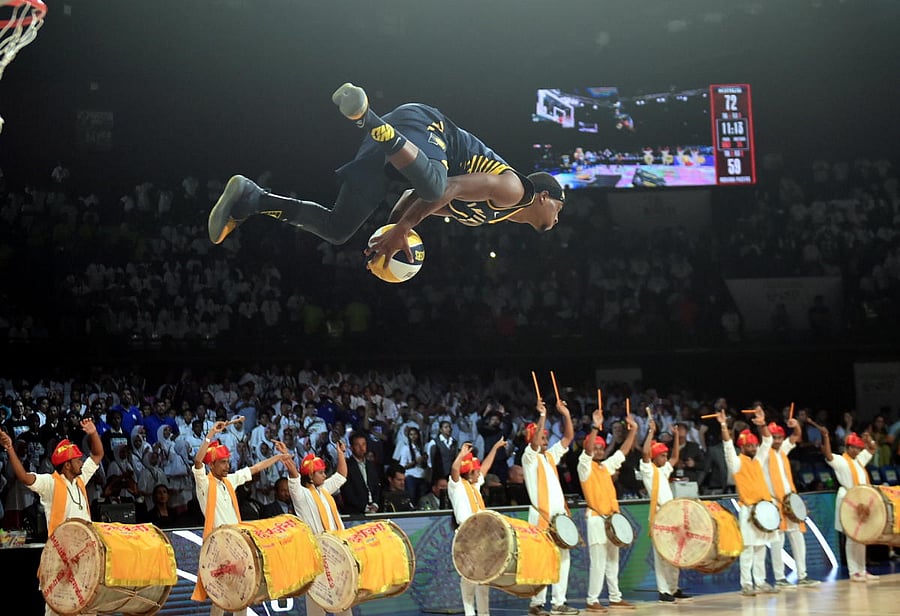 Indiana Pacers player T J Warren performs a stunt in action during the NBA India Games 2019 in Mumbai on Oct 4, 2019. (PTI Photo)