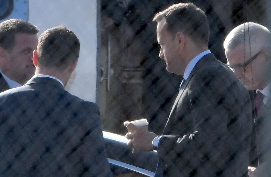 Ireland's Prime Minister Leo Varadkar (2R) walks to a car after landing at Liverpool John Lennon Airport in Livepool, north-west England on October 10, 2019, ahead of meeting Britain's Prime Minister for Brexit talks. (AFP)