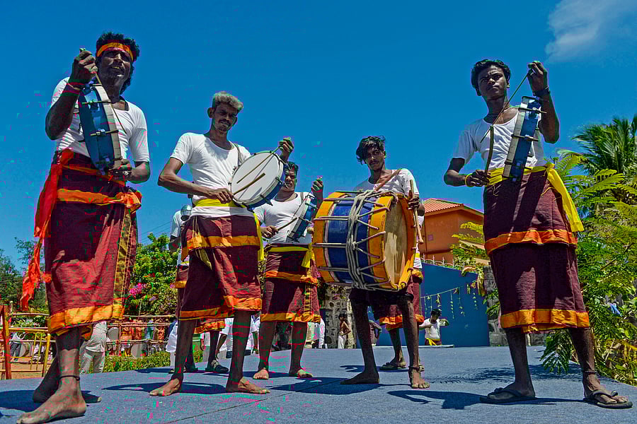 Chenda Melam (Kerala's percussion instruments) artists prepare to welcome China's President Xi Jinping in Chennai on October 11, 2019, ahead of a summit with India's Prime Minister Narendra Modi (L) to be held at world heritage site of Mahabalipuram from October 11 to 12 in Tamil Nadu state. (AFP Photo)