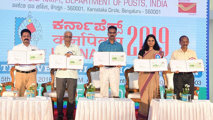 Dakshina Kannada Deputy Commissioner Sindhu B Rupesh releases the special cover on ‘Mattu Gulla’, during ‘Karnapex 2019’ in Mangaluru on Sunday.