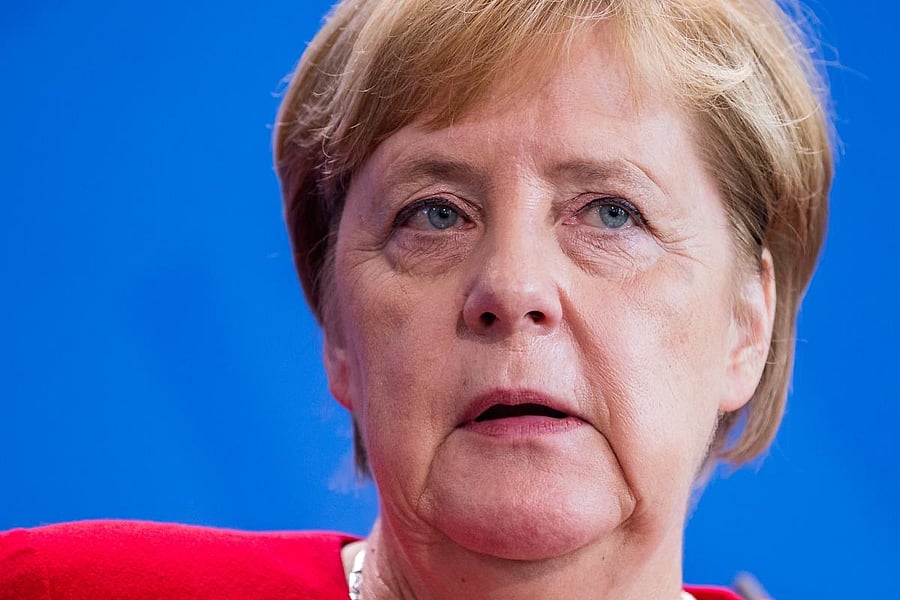 German Chancellor Angela Merkel speaks during a joint press conference with Norway's Prime Minister after bilateral talks on October 15, 2019 at the Chancellery in Berlin. (Photo by AXEL SCHMIDT / AFP)