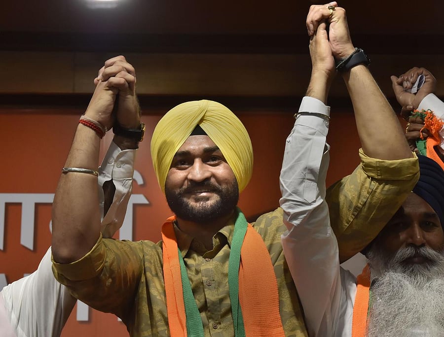 New Delhi: Former Indian hockey captain Sandeep Singh joins BJP in New Delhi, Thursday, Sept. 26, 2019. PTI