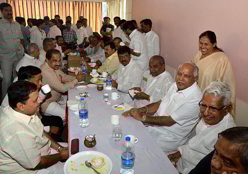 Former CM B S Yeddurappa with his supporters at the breakfast hosted by him at a hotel in Belagavi on Friday. DH Photo Anand Bakshi