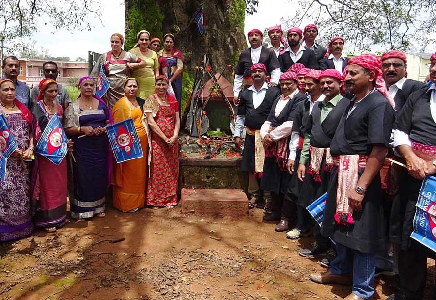 Codava National Council members celebrate 'Kail Pold' festival, near Madikeri Junior College on Friday. dh photo