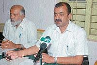 Zilla Panchayat Standing committee for education and health President Manu Muthappa addressing a news conference in Madikeri on Thursday. DH PHOTO