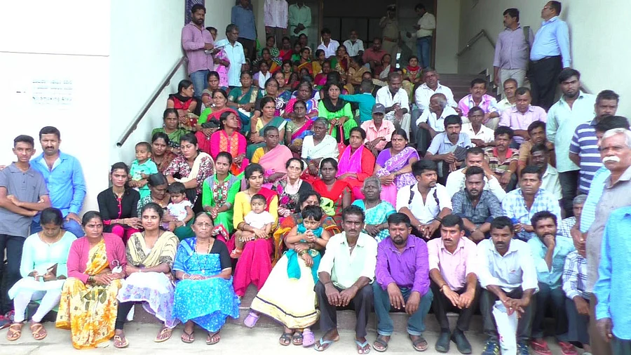 Haleri residents stage a protest in front of the DC's office in Madikeri on Monday.