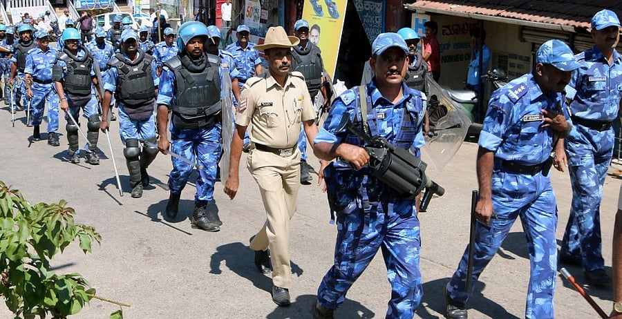 RAF personnel take out a route march ahead of Tipu Jayanti in Somwarpet in Kodagu on Friday.