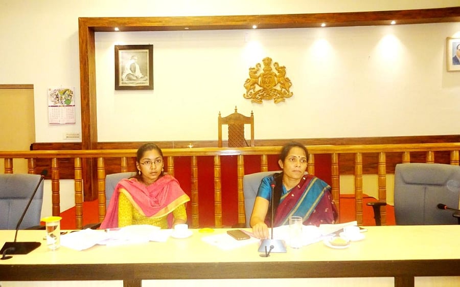 Deputy Commissioner Annies Kanmani Joy chairs a progress review meeting at her office in Madikeri on Monday. Zilla Panchayat Chief Executive Officer K Lakshmi Priya looks on.