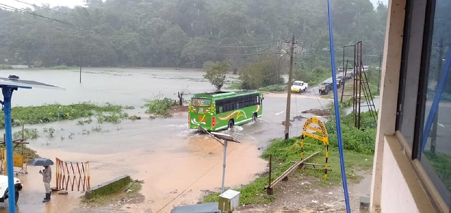 Bhagamandala road is inundated due to heavy rain.