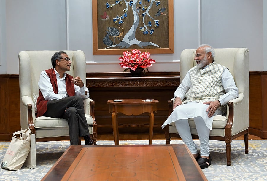 Prime Minister Narendra Modi and Nobel Laureate Abhijit Banerjee. (Photo/Twitter)