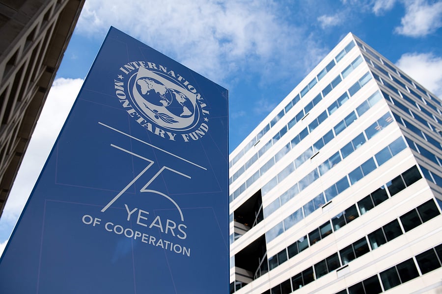 World Bank Annual Meetings hang outside International Monetary Fund Headquarters in Washington. (AFP Photo)