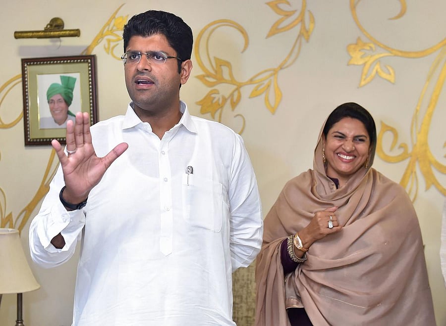 Jannayak Janata Party chief Dushyant Chautala and his mother Naina Chautala. PTI Photo