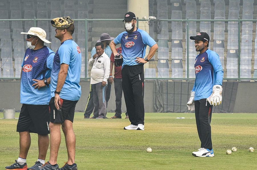 Bangladeshi cricketer Mushfiqur Rahim with coach Daniel Vettori and other support staff members during a practice session at Arun Jaitley Stadium in New Delhi, Friday, Nov. 1, 2019. PTI Photo