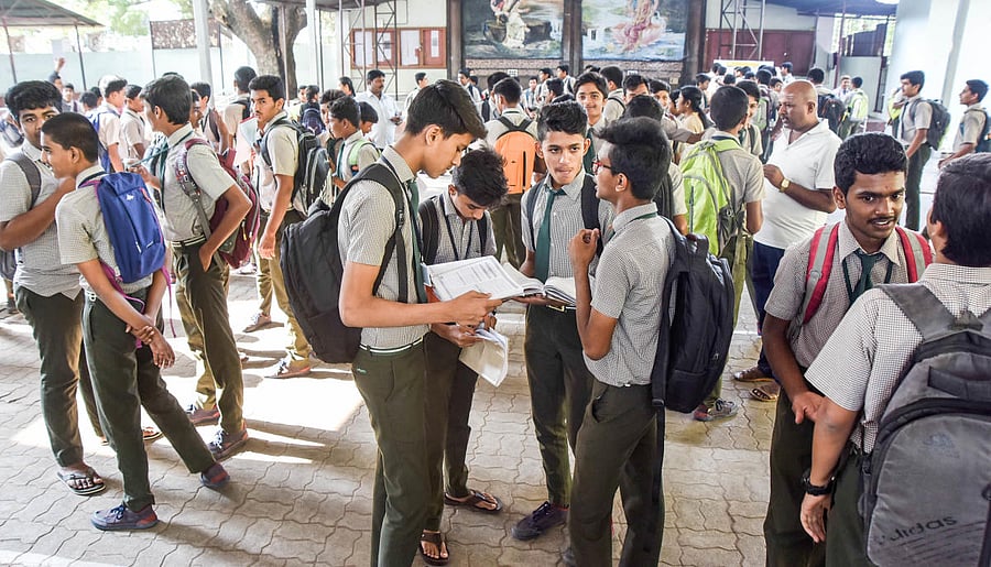 The department of primary and secondary education is thinking of distributing photocopies of answer scripts of previous years' SSLC toppers.