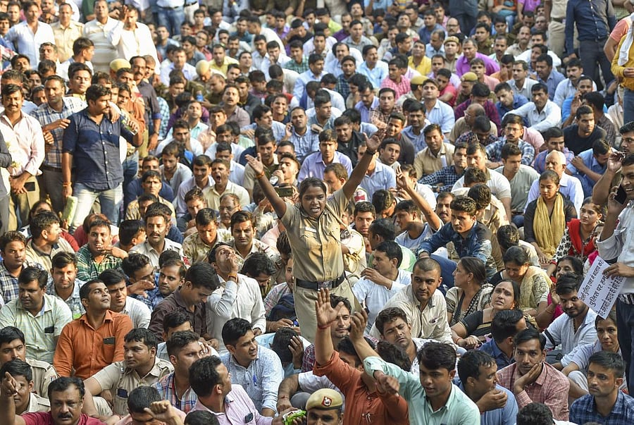 Police personnel protest in New Delhi on Tuesday. PTI