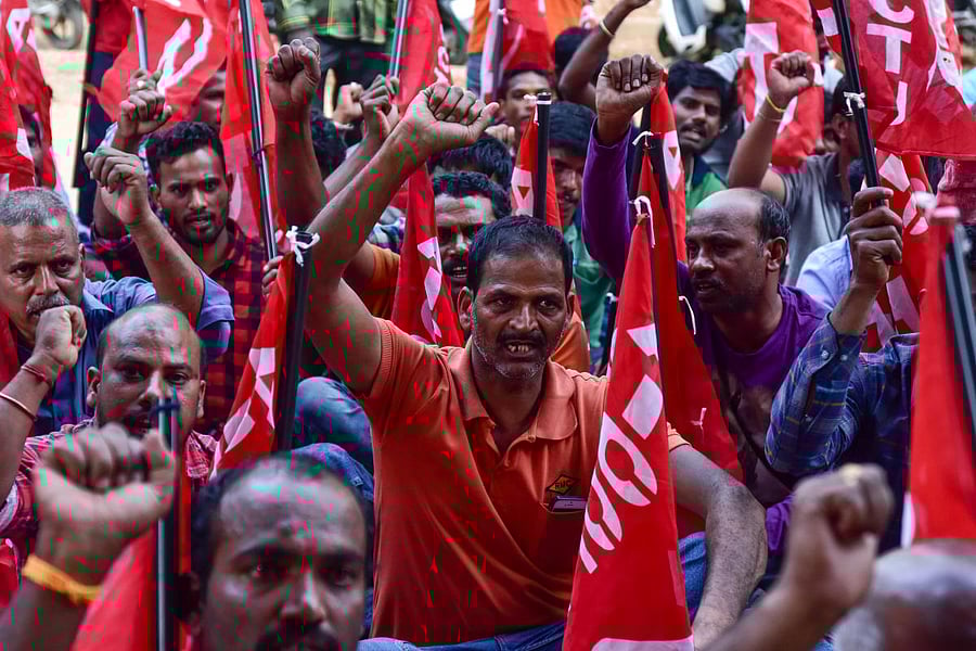 Ready-mix concrete workers protest in Bengaluru on Tuesday. DH PHOTO/IRSHAD MAHAMMAD