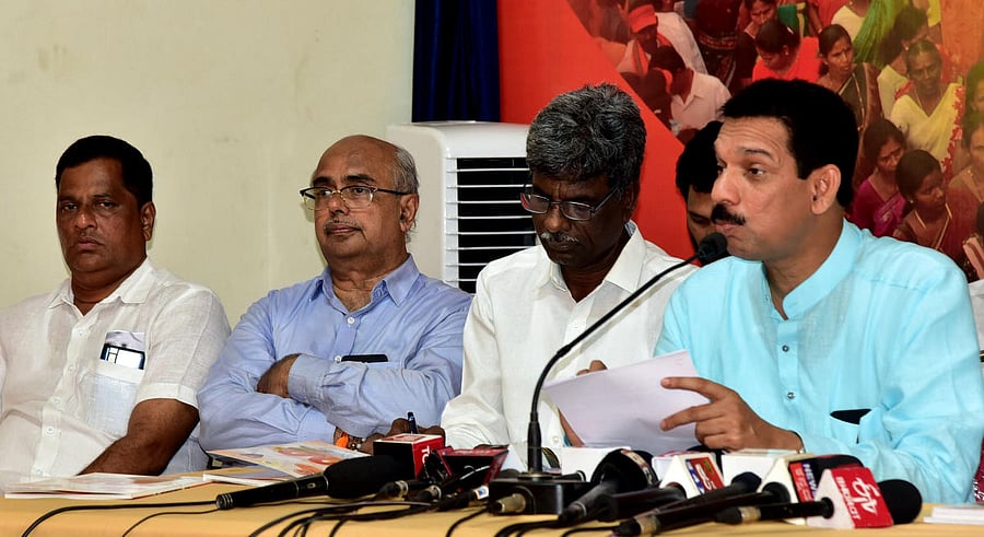 MP and BJP state president Nalin Kumar Kateel speaks at a press conference at BJP district office in Mangaluru. Minister Kota Srinivas Poojary and former MLA Yogish Bhat look on.