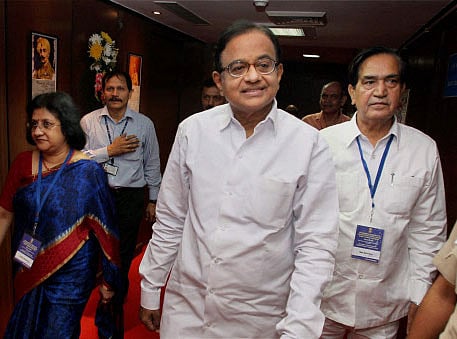 Finance Minister P. Chidambaram flanked by SBI Chairman Arundhati Bhattacharya and MoS Namo Narain Meena during a meeting with the CMDs of Public Sector Banks and Financial Institutions in New Delhi on Tuesday. PTI Photo