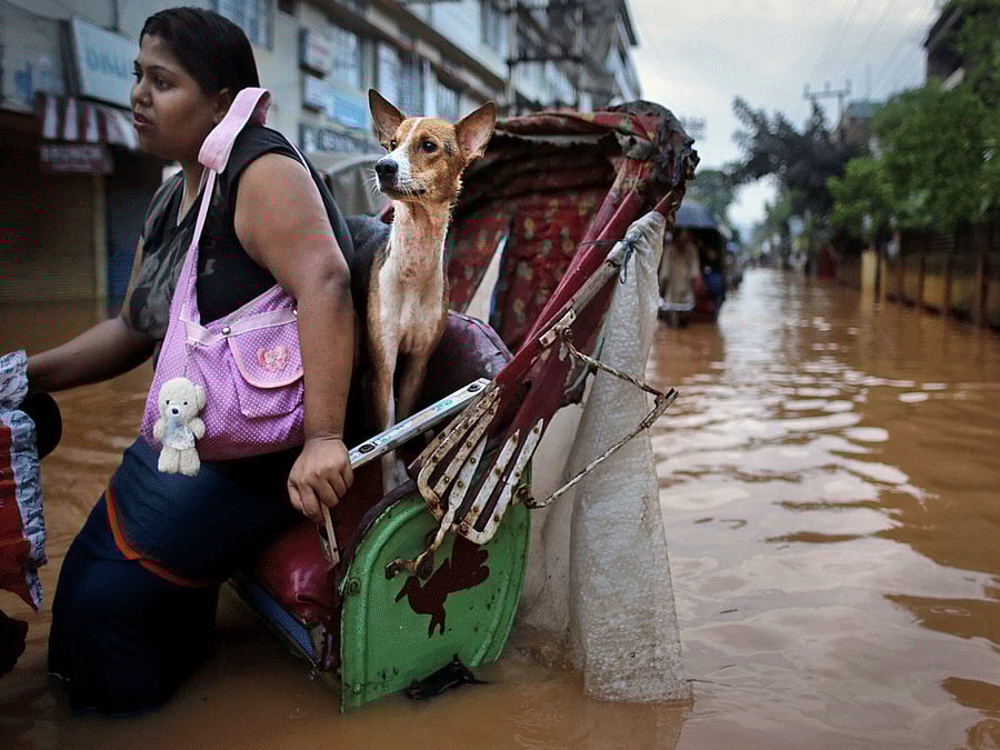 Flood situation in Bangladesh worsened as over 100 villages have been submerged after gushing waters washed away a portion of an embankment on Jamuna river in the country's northwest, affecting over one lakh people. AP photo for representation purpose