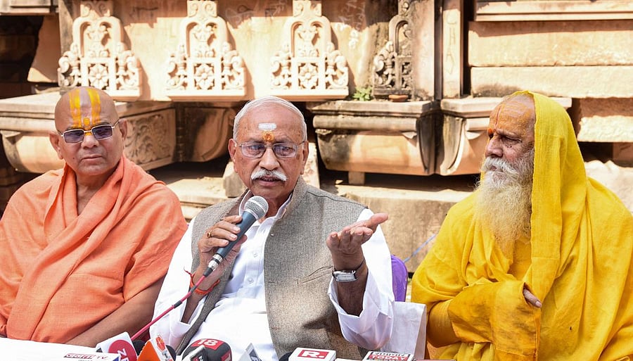 VHP leader Dinesh Ji (C) addresses a press conference at Ramjanmbhoomi Nyas Karyashala in Ayodhya on Wednesday. (PTI Photo)