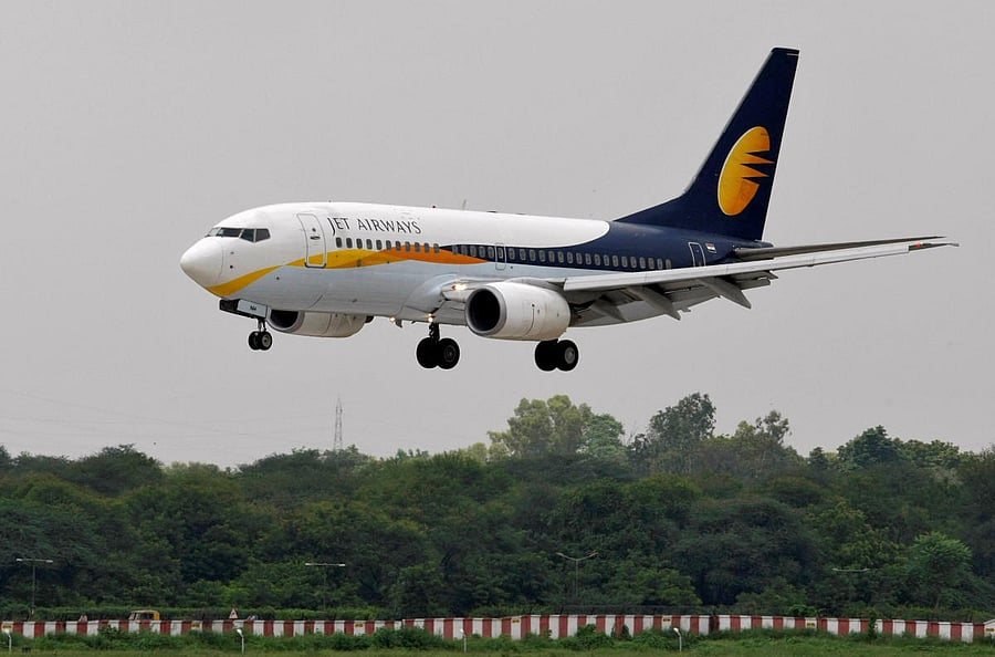 A Jet Airways passenger aircraft prepares to land at the airport in Ahmedabad. REUTERS File Photo