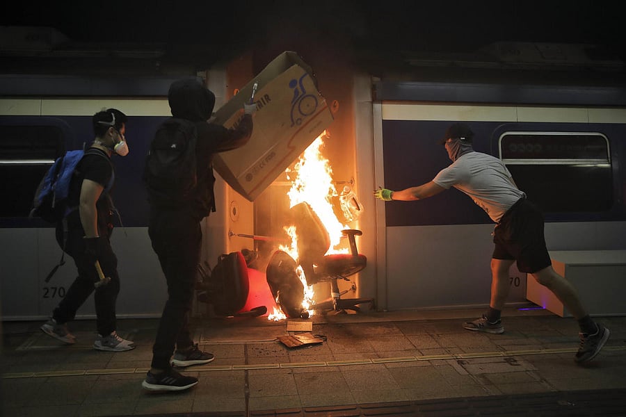 Students burn a train inside the Chinese University MTR station in Hong Kong, Wednesday, Nov. 13, 2019. (AP/PTI Photo)