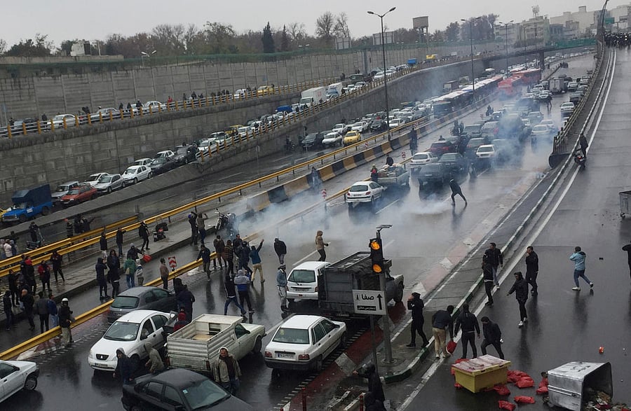 People protest against increased gas price, on a highway in Tehran, Iran November 16, 2019. (Nazanin Tabatabaee/WANA (West Asia News Agency) via REUTERS)
