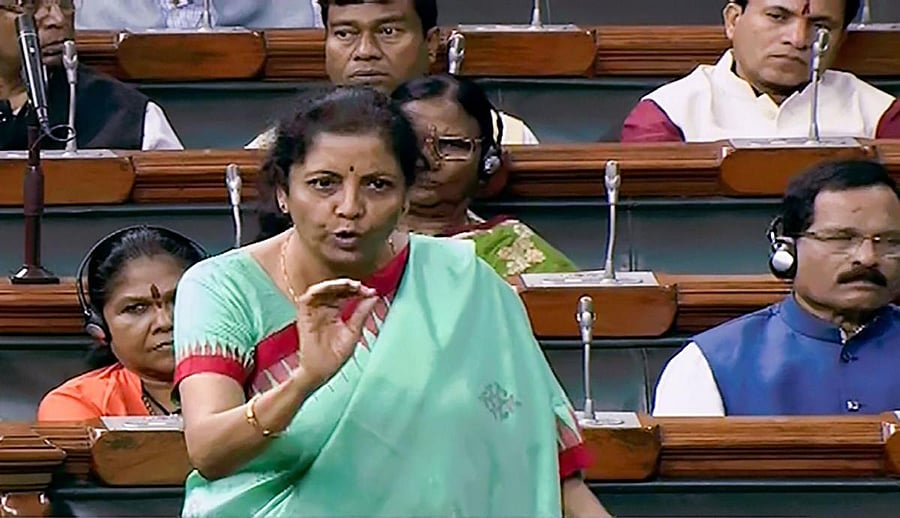 Finance Minister Nirmala Sitharaman speaks in the Lok Sabha during the Winter Session of Parliament, in New Delhi. (PTI Photo)