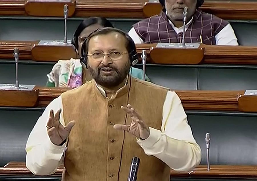 Environment Miniser Prakash Javadekar speaks in the Lok Sabha during the Winter Session of Parliament, in New Delhi, Friday, Nov. 22, 2019. (LSTV/PTI Photo)