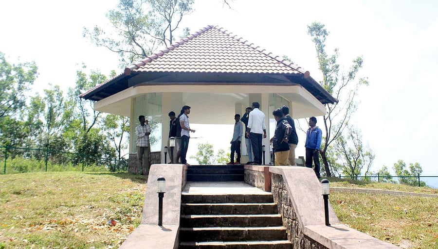 Forest department personnel inspect the place where the leopards were said to have been spotted.
