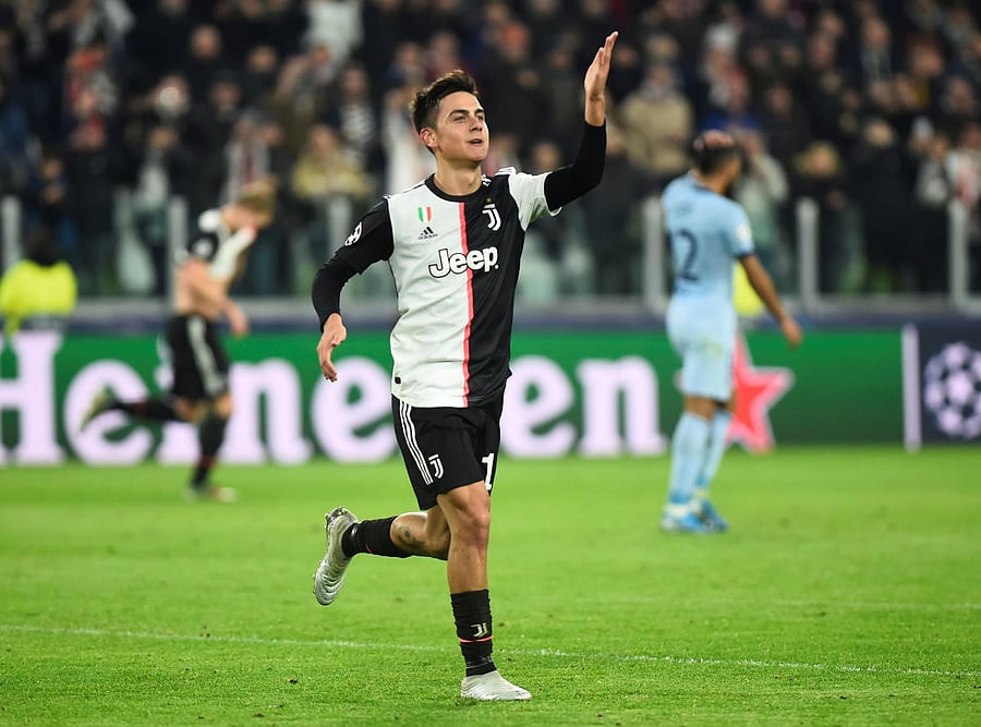 Juventus' Paulo Dybala celebrates scoring their first goal. (Reuters photo)