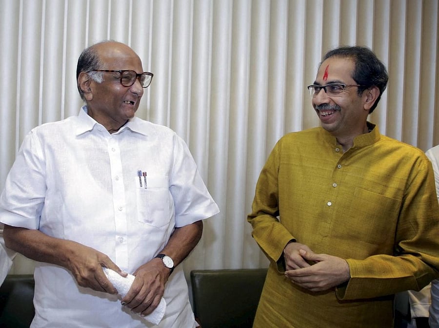 Shiv Sena President Uddhav Thackeray with NCP chief Sharad Pawar. (PTI file photo)