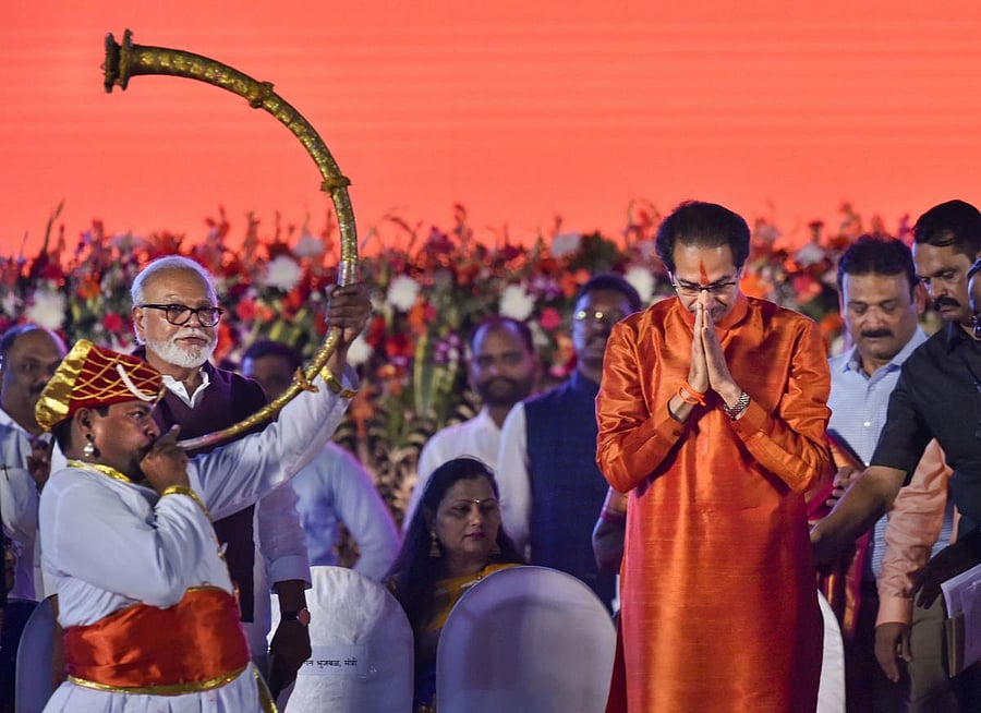 Shiv Sena President Uddhav Thackeray greets his supporters during his swearing-in ceremony as the 18th Chief Minister of Maharashtra, at Shivaji Park in Mumbai, Thursday, Nov. 28, 2019. (PTI Photo)