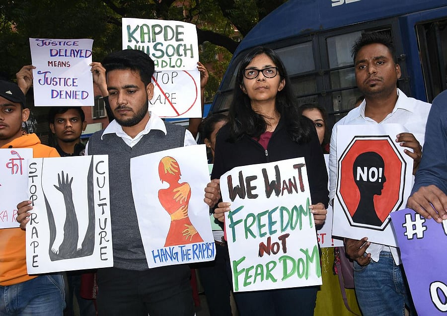 Delhi Commission for Women Chairperson Swati Maliwal takes part in a protest over the gangrape and murder of woman veterinarian in Hyderabad. PTI photo
