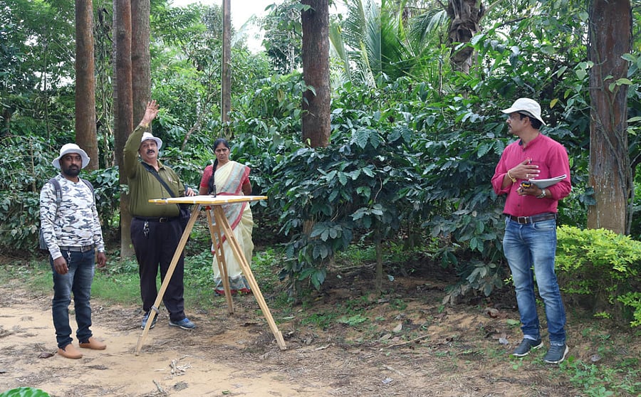 The survey work on the land being carried out as per the direction of the court at Bettadakadu.